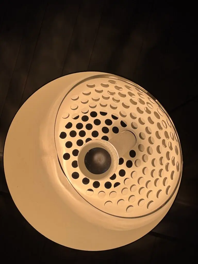 FLOS Arco lamp with half chrome globe bulb