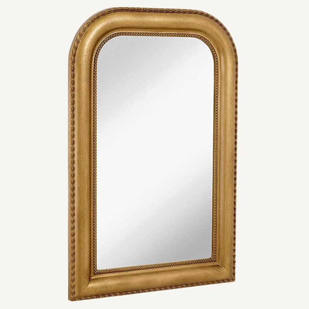 Vintage look arched mirror with soft gold frame