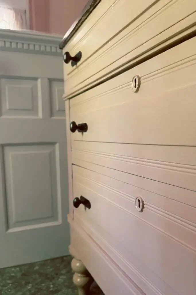 Oil rubbed knobs and backplates in the guest bathroom restored vintage dresser vanity