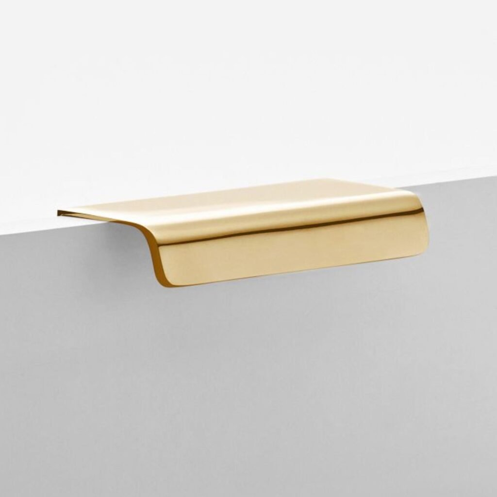 Barrington edge pull from Rejuvenation, an edge-mounted cabinet pull for inset doors and drawers
